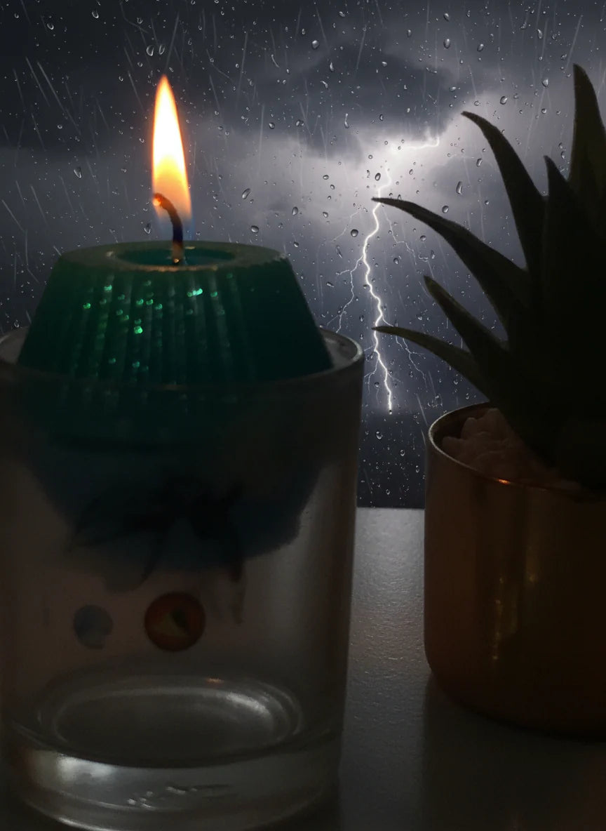 Candle in glass with light soot effect